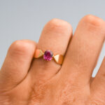 Vibrant pink gemstone ring set in elegant gold, showcasing custom jewellery craftsmanship at Don Laurence Jewellery. Perfect for special occasions or luxurious everyday wear.