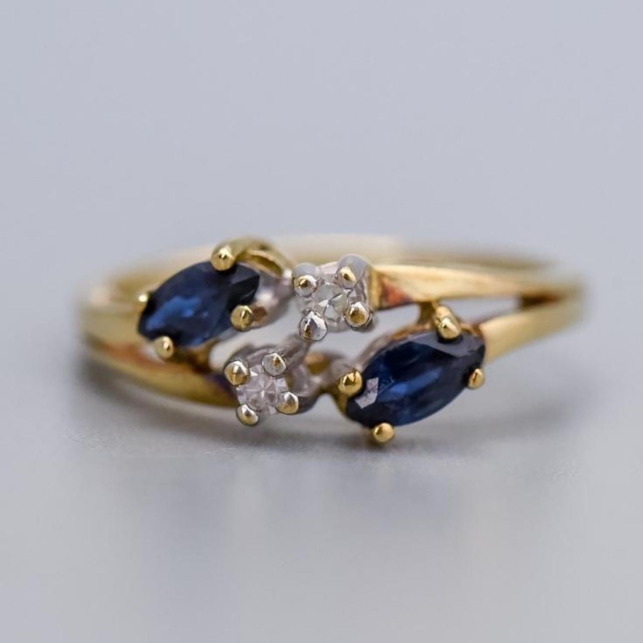 9K Gold Sapphire and CZ Ring