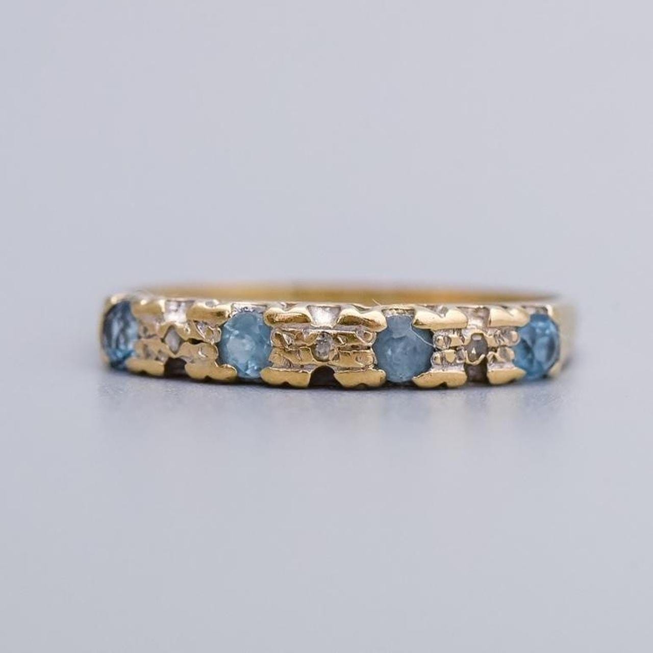 9K Gold Topaz and Diamond Ring