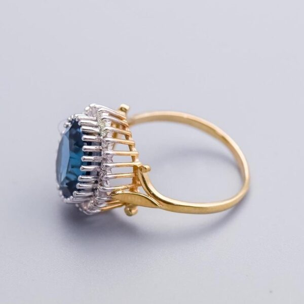9K Gold Blue Topaz Ring