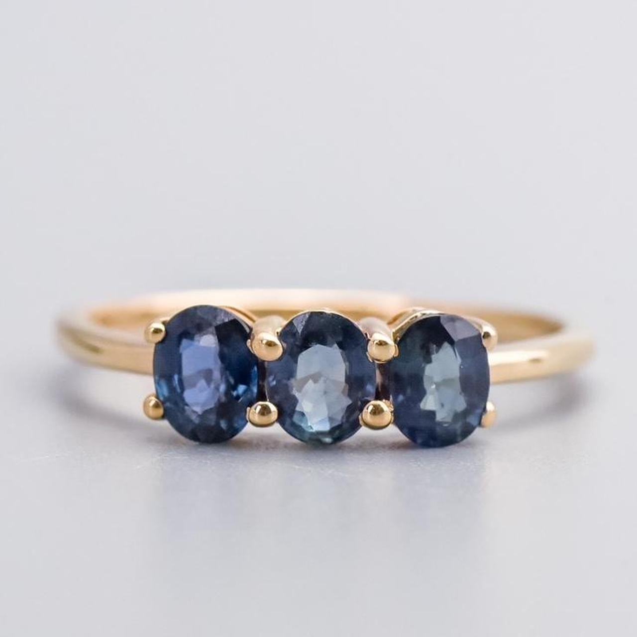 10K Gold Teal Sapphire Trilogy Ring