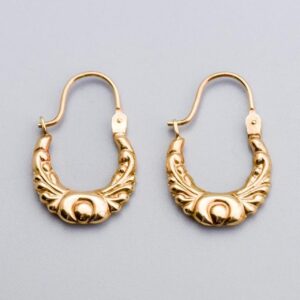 Solid 9K Gold Creole Earrings  This pair of 9K gold creole earrings features a graceful oval design, adorned with intricate Bohemian-style patterns that add a touch of artistry and charm.   The earrin
