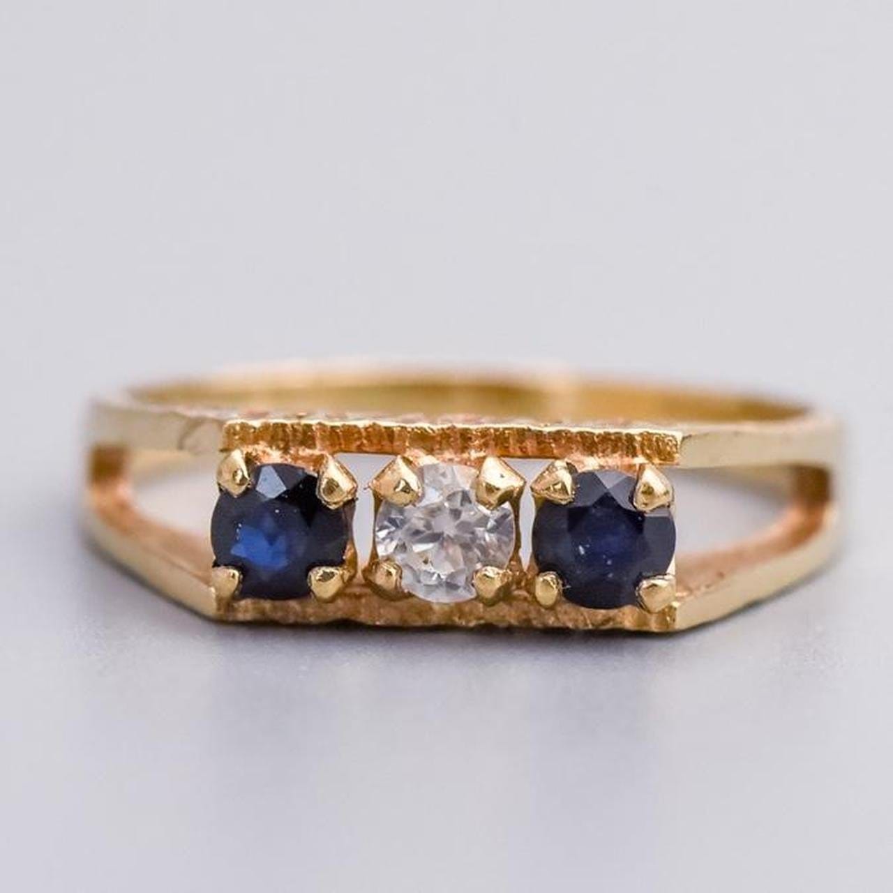 9K Gold Sapphire and CZ Ring