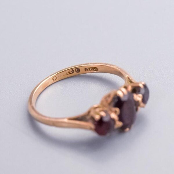 9K Gold Garnet Trilogy Ring