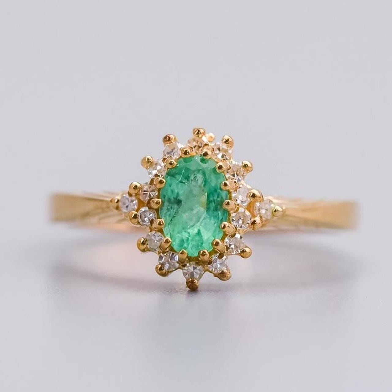 9K Gold Emerald and Diamond Ring