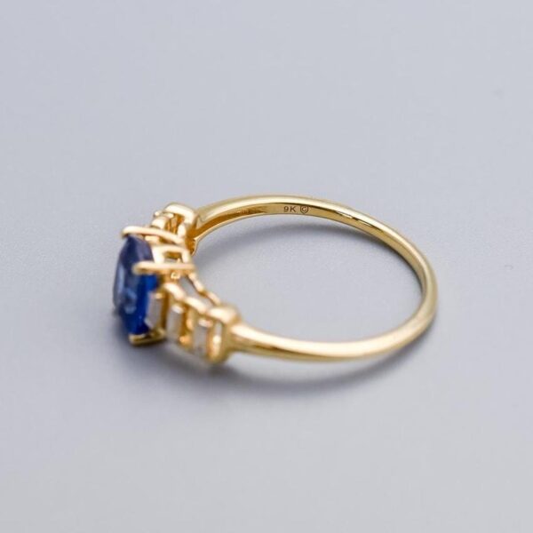 9K Gold Sapphire and CZ Ring