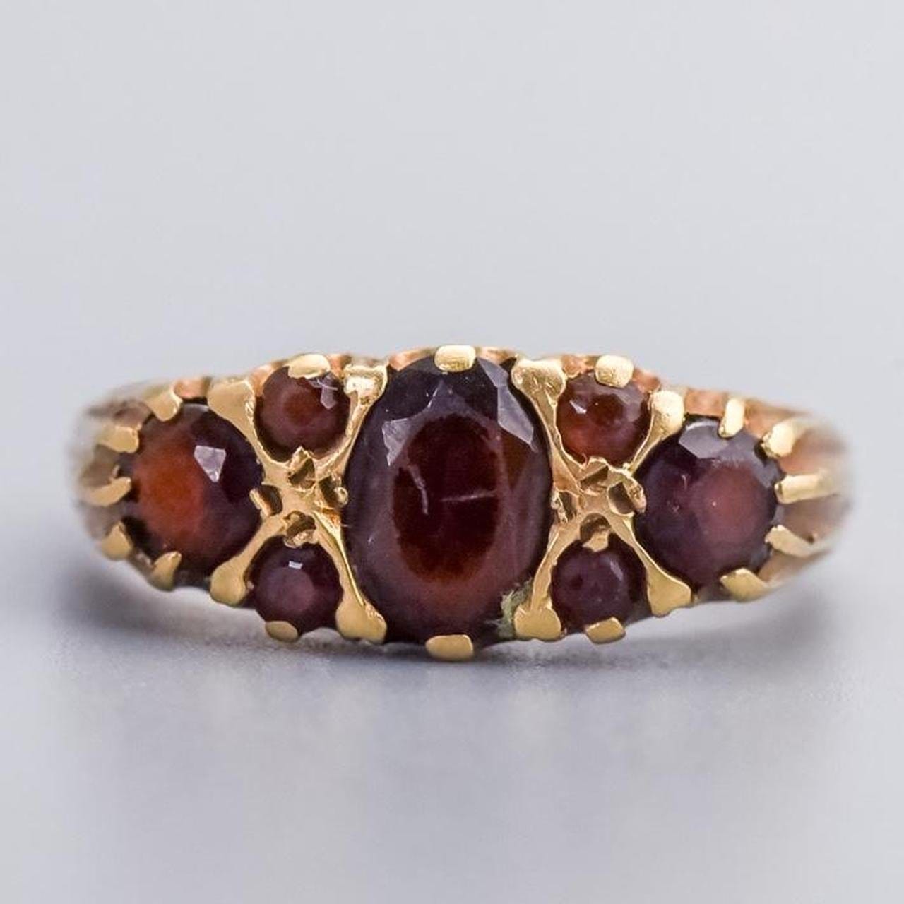 9K Gold Seven Stone Red Garnet Ring